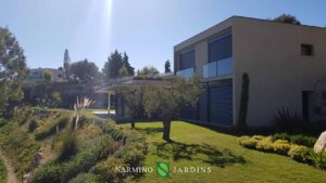 A view of one of the villas and its gardens maintained by Narmino Jardins